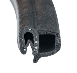 Door or boot seal with side foam bulb and metal-reinforced clip